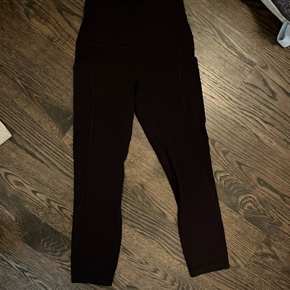 Black cropped lululemon leggings with pockets